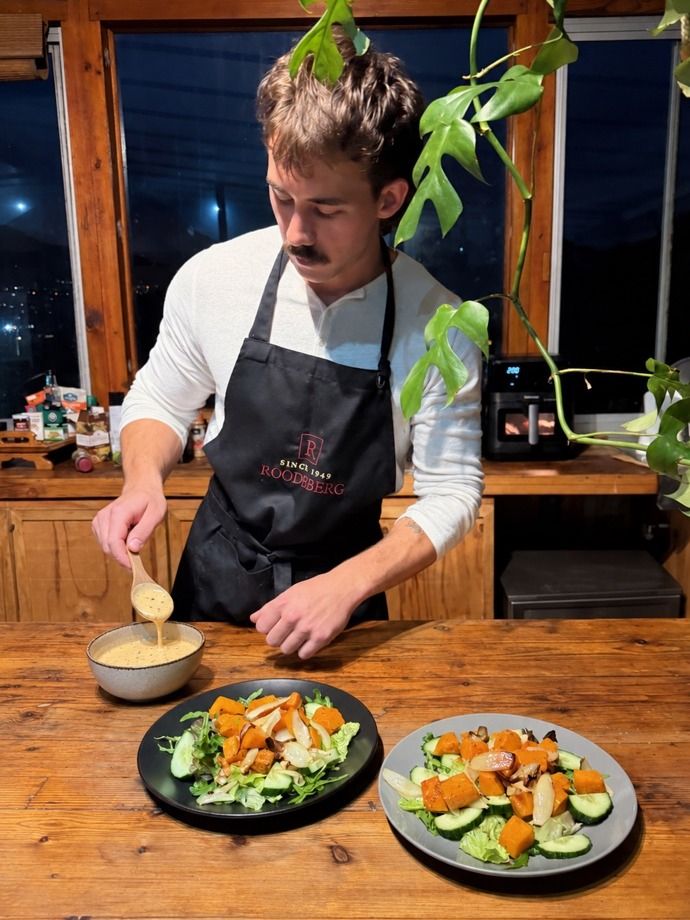 Matthew dressing two roast butternut salads