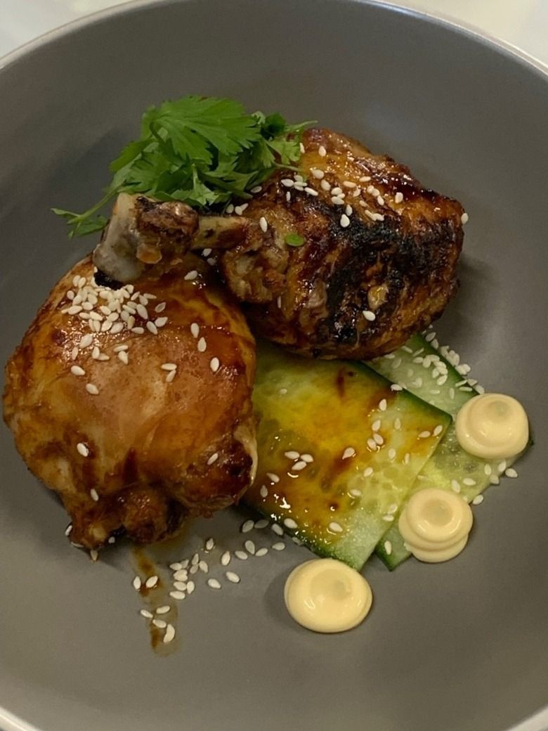 Sticky glazed chicken with cucumber and sesame